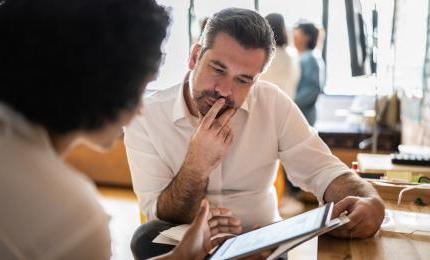 people reviewing paperwork